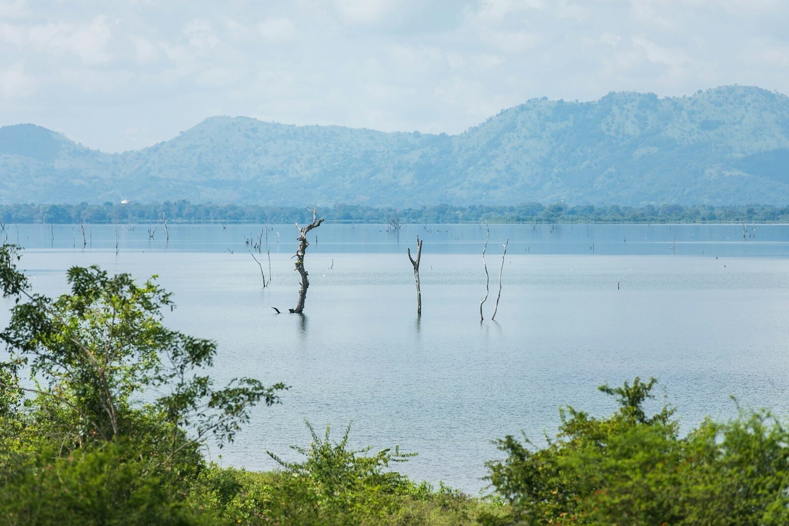 grey clouds hovering over lake